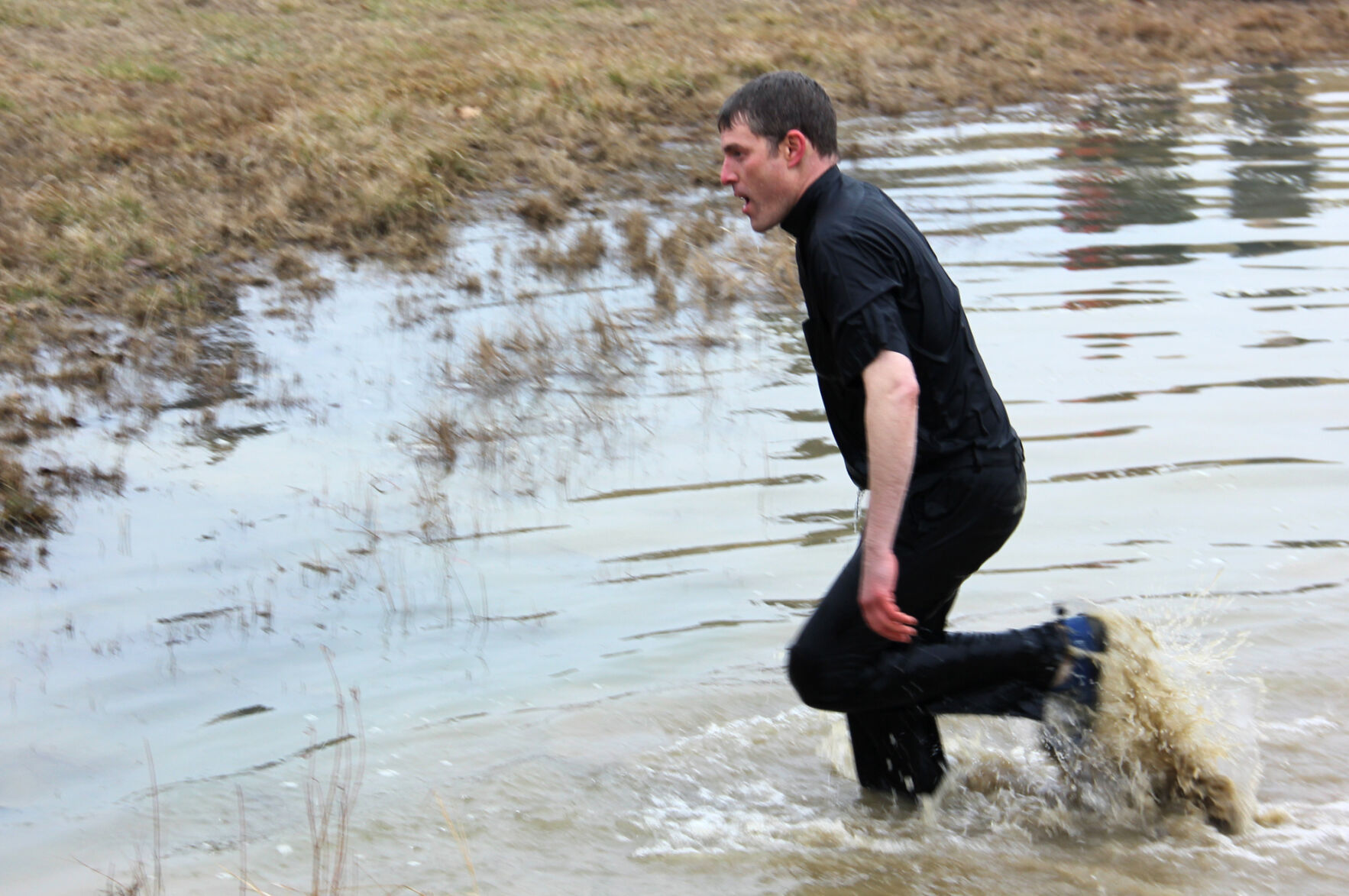 Father Tim Foy Exits the Water